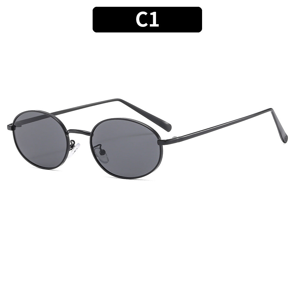 Gafas de sol ovaladas retro con montura metálica elegante