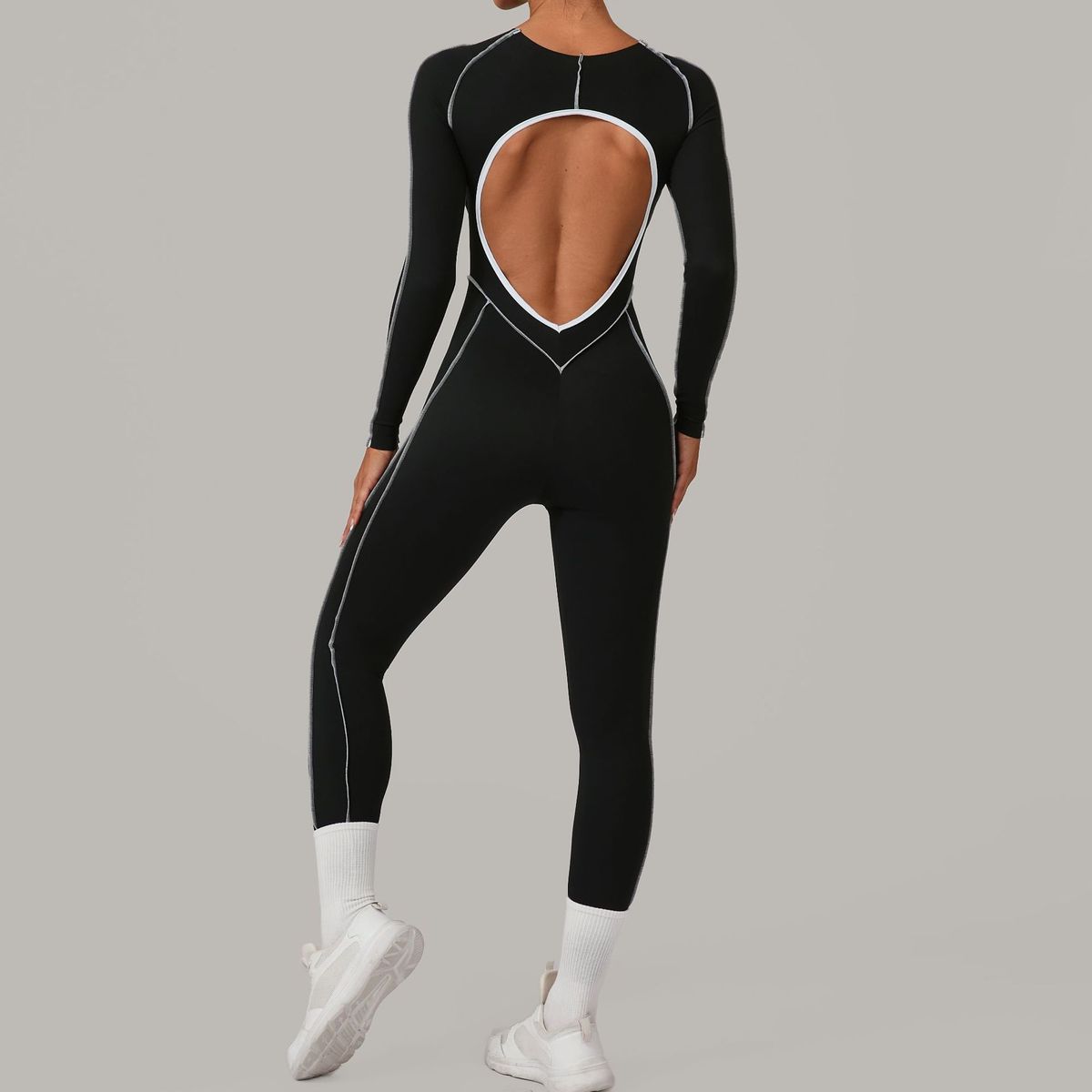 Combinaison de yoga dos nu à manches longues et couleurs assorties pour femmes