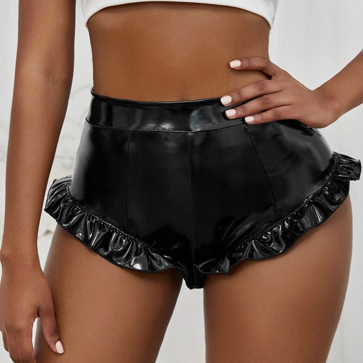 Pantalones cortos de cuero sintético de color liso sexys a la moda para mujer