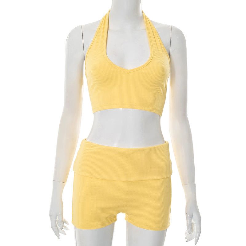 Conjunto de top y pantalones cortos con cuello halter y canalé de color liso para mujer, primavera y verano