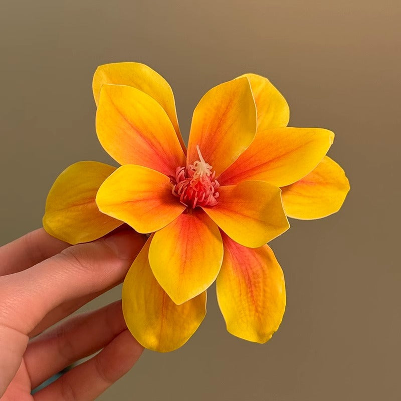 Horquilla floral amarilla para vacaciones en la playa