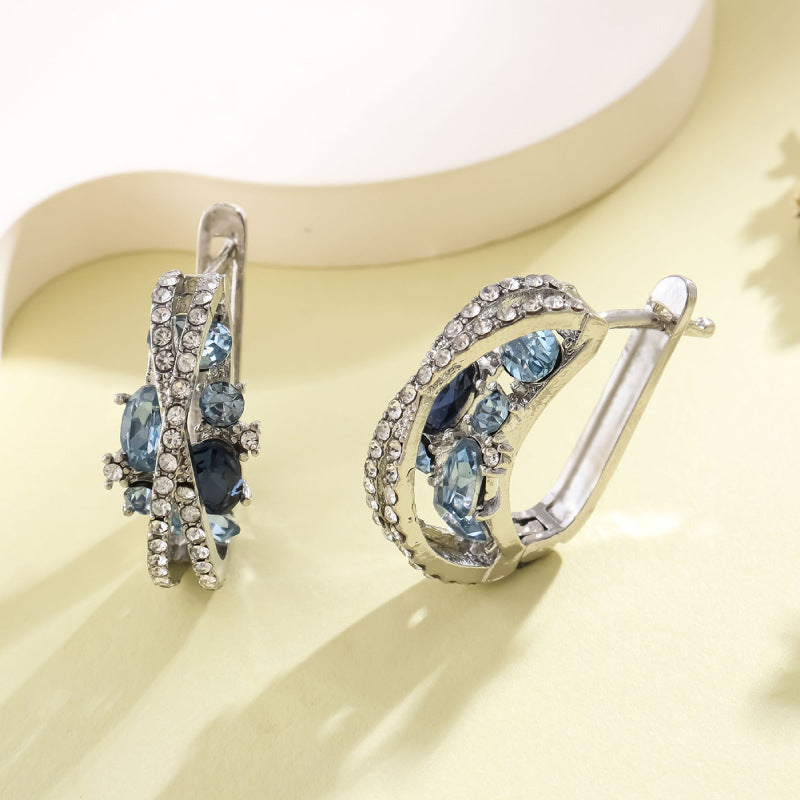 Boucles d'oreilles creuses en zircon en forme de X double pour femmes