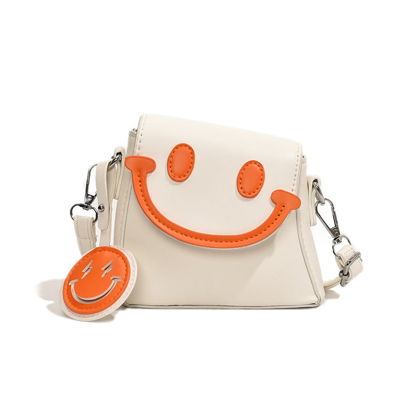 Lindo bolso bandolera mini con carita sonriente de dibujos animados