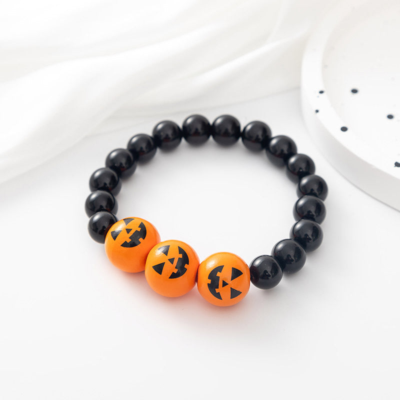 Pulsera de cuentas de Halloween con calabaza y calavera de dibujos animados