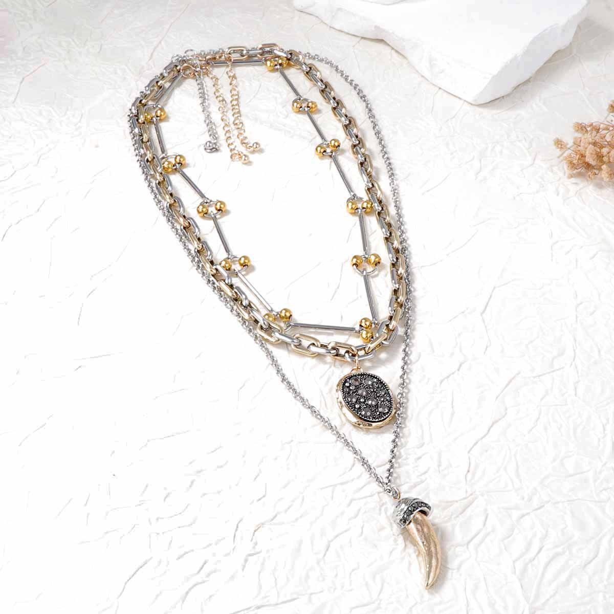 Conjunto de collar con colgante de cuerno de animal de aleación único y creativo para mujer