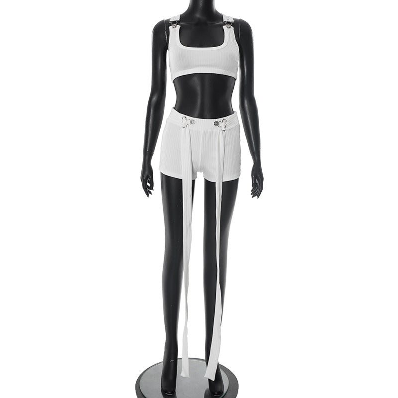 Conjunto de dos piezas de camiseta sin mangas y pantalones cortos ajustados de color liso sexy para mujer