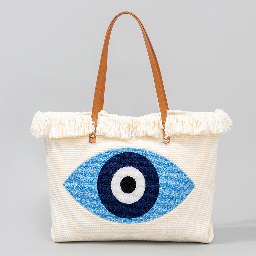 Bolsa de lona bordada con ojos bohemios