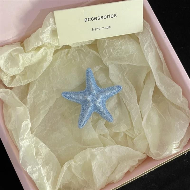 Accesorios para el cabello para vacaciones de verano junto al mar con estrellas de mar