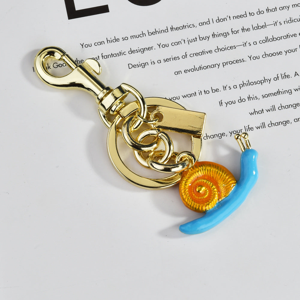 Porte-clés pendentif sac escargot tendance en alliage organique marin, accessoires tendance