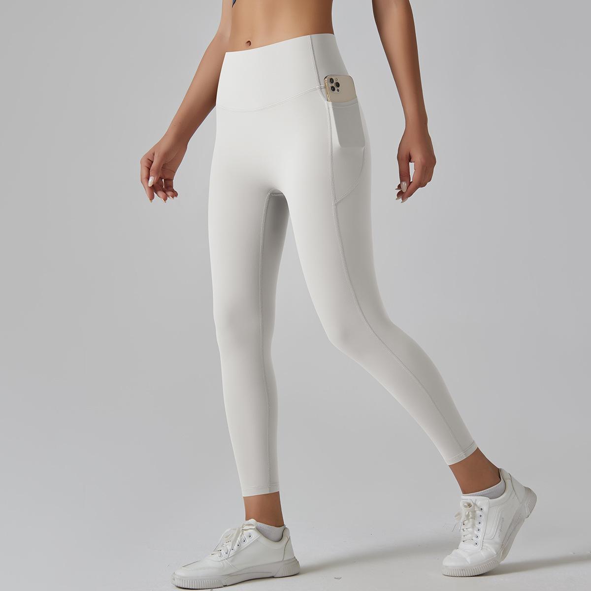Leggings de yoga de cintura alta y secado rápido para mujer con bolsillos
