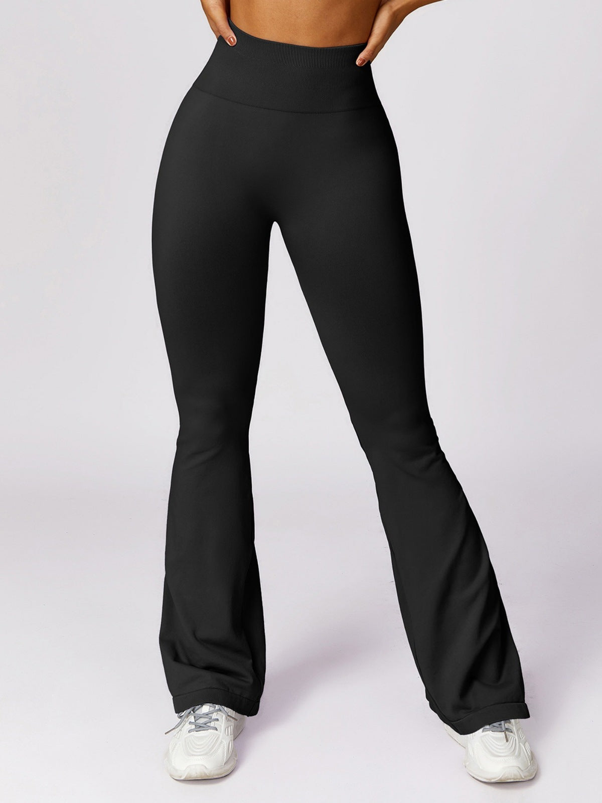 Pantalones deportivos acampanados de color liso de moda de yoga para mujer