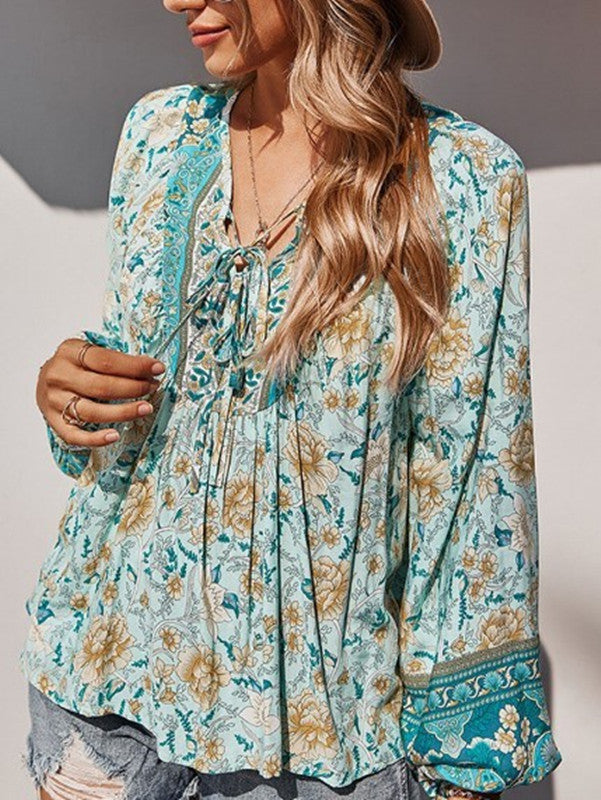 T-shirt décontracté à col en V et imprimé floral pour femme