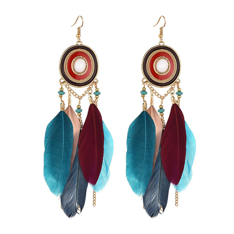 Pendientes bohemios con borlas de plumas exageradas
