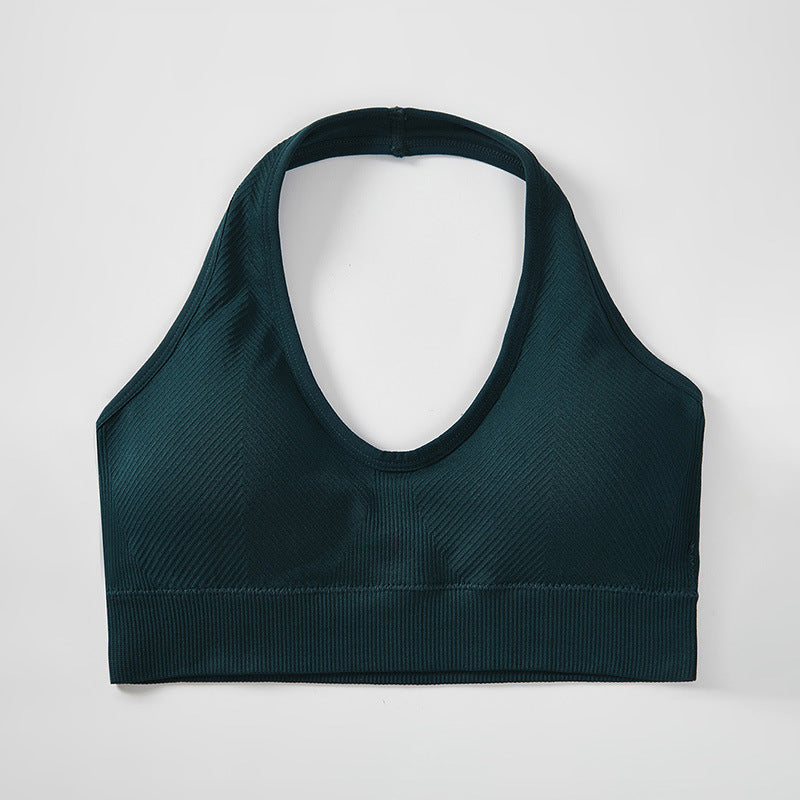 Sujetador deportivo sexy de cuello halter de color sólido a la moda para mujer