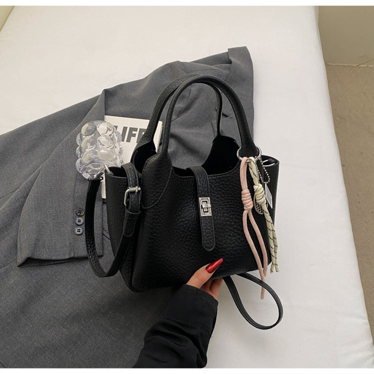 Sac à main seau décontracté de couleur unie pour femme avec motif litchi