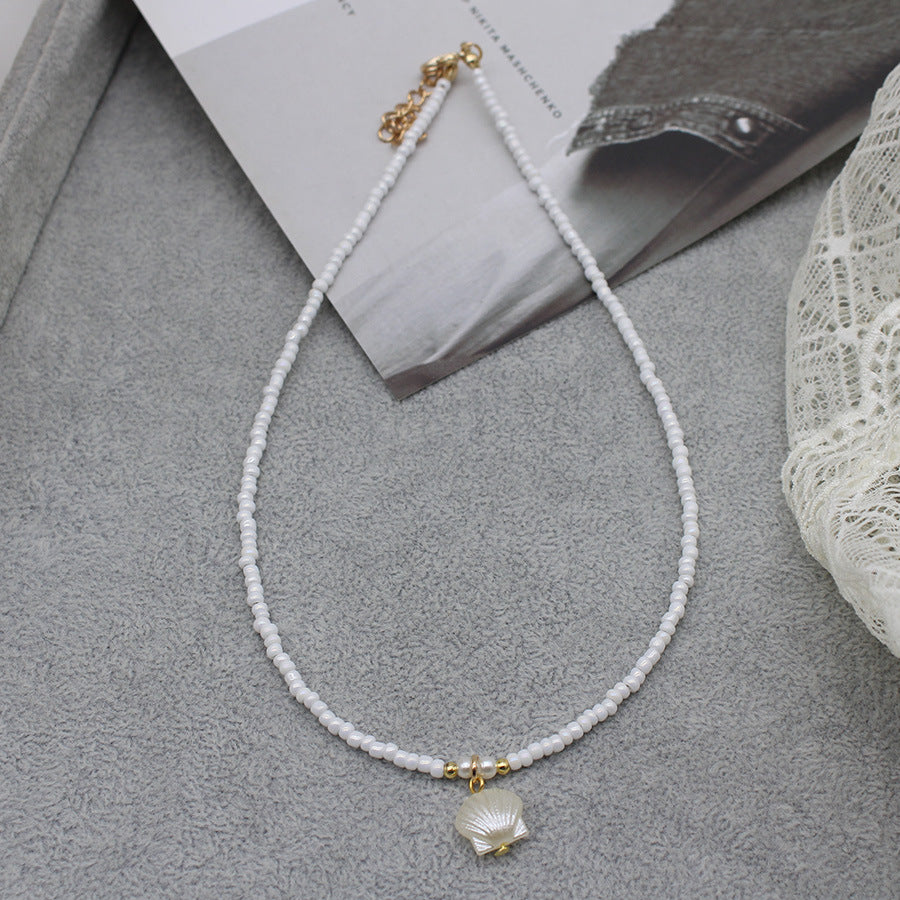 Collar con colgante de estrella de mar y cuentas de moda para mujer con detalles de aleación.