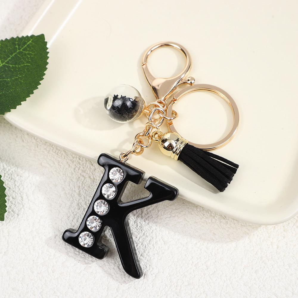 Llavero de resina negra con letras de diamantes de imitación, accesorio de arte moderno