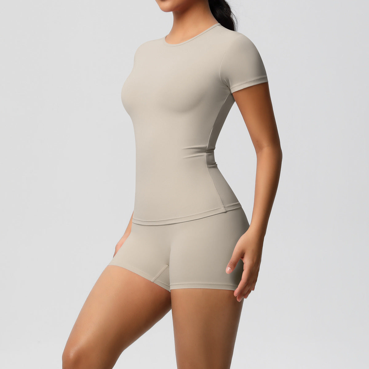 Ensemble de yoga décontracté pour femme, t-shirt à manches courtes et short moulant de couleur unie