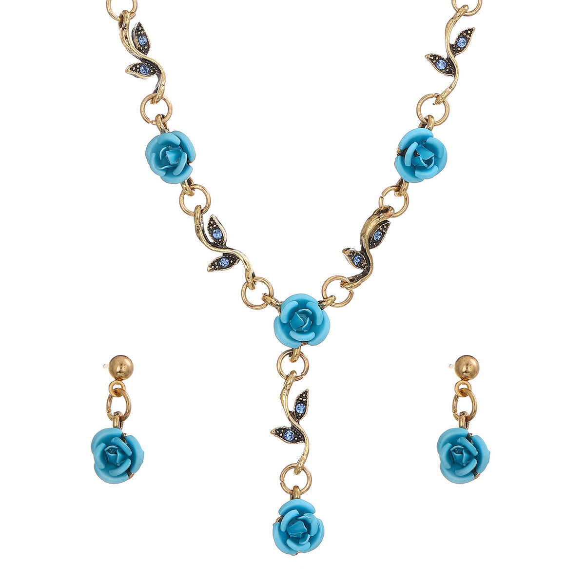 Conjunto de tres piezas de joyería floral con rosas vintage