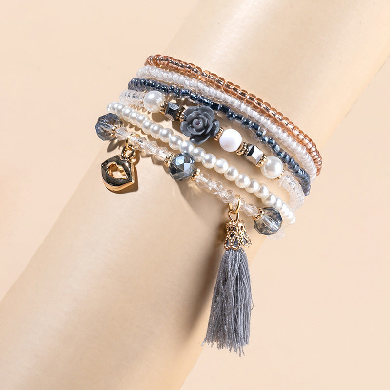Conjunto de pulseras elásticas de cuentas de arroz multicolor bohemias