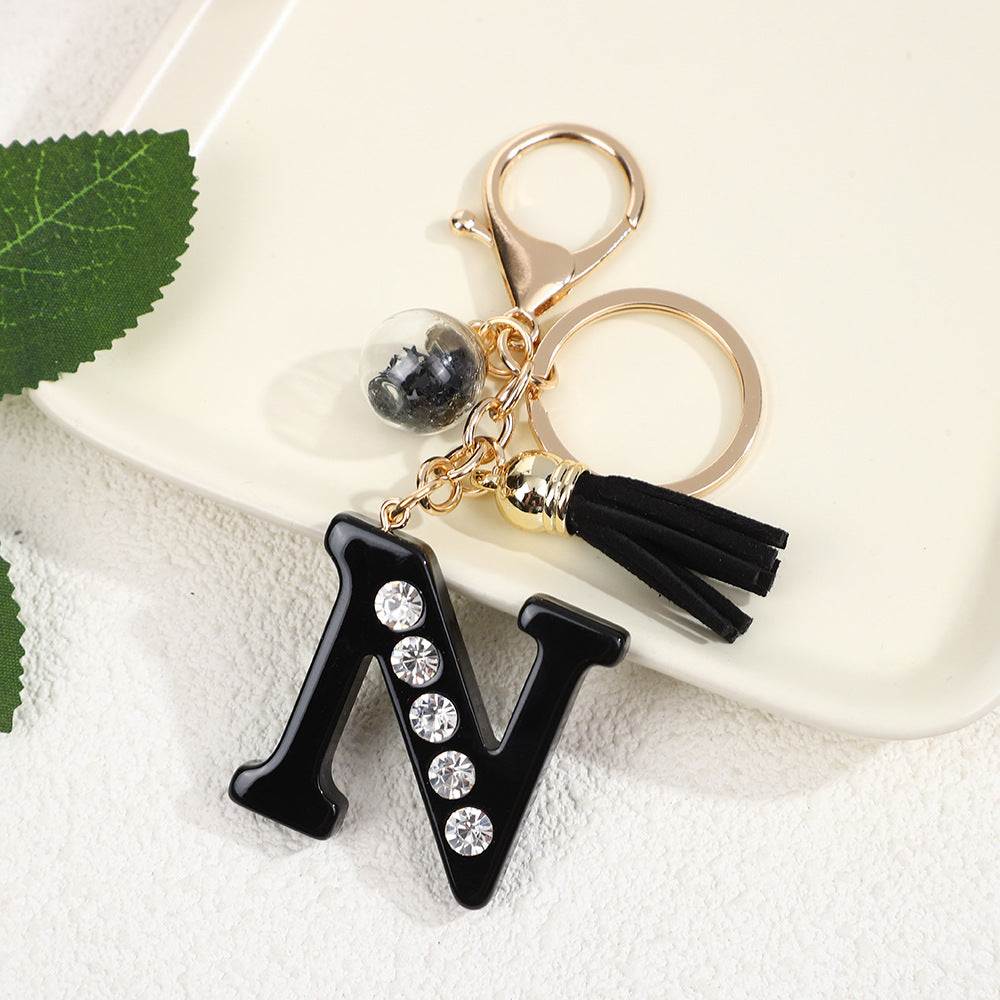 Llavero de resina negra con letras de diamantes de imitación, accesorio de arte moderno