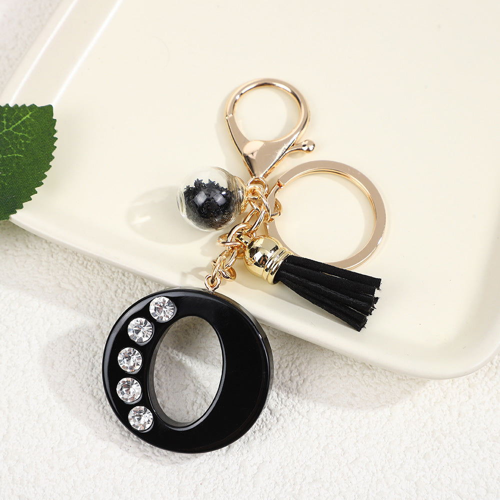 Llavero de resina negra con letras de diamantes de imitación, accesorio de arte moderno