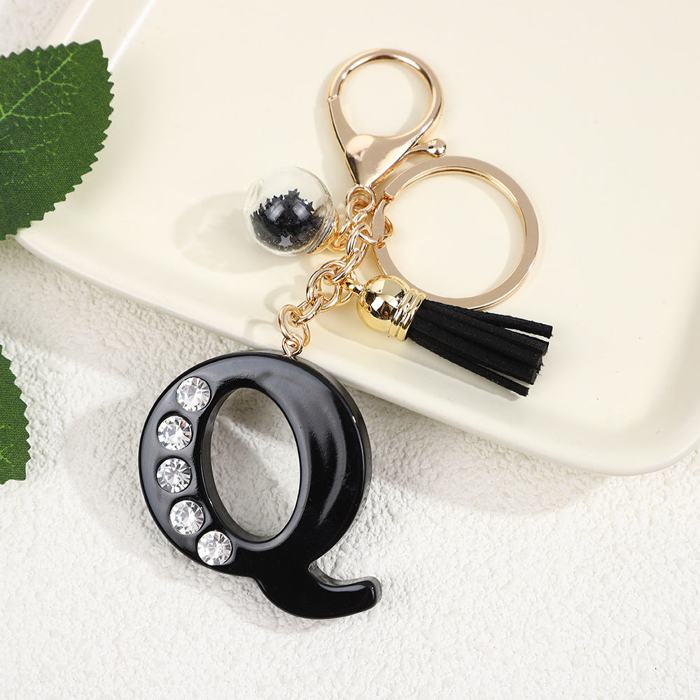 Llavero de resina negra con letras de diamantes de imitación, accesorio de arte moderno