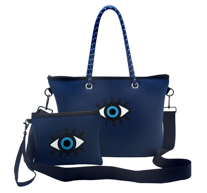 Bolso de mano de gran capacidad con diseño de ojo malvado