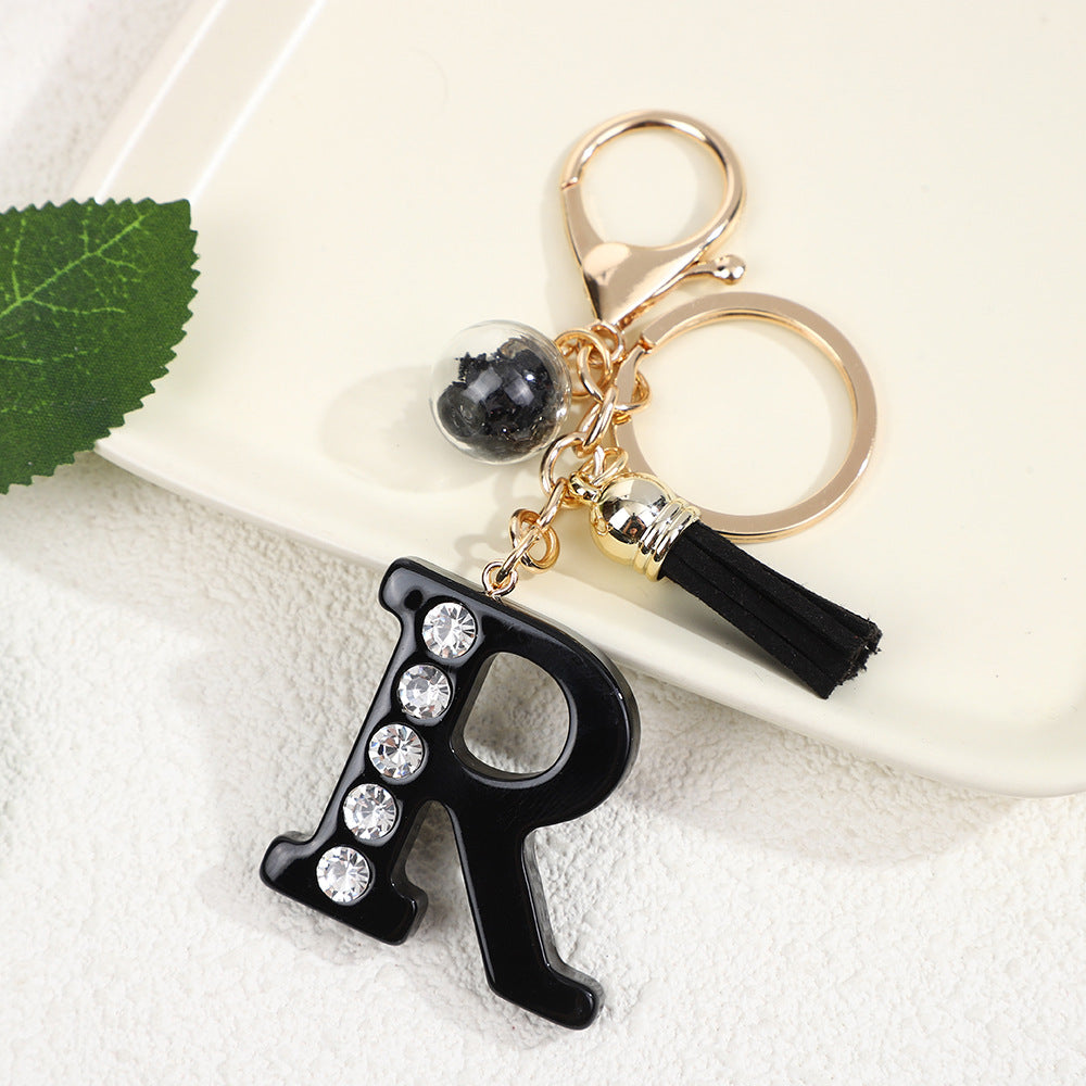 Llavero de resina negra con letras de diamantes de imitación, accesorio de arte moderno