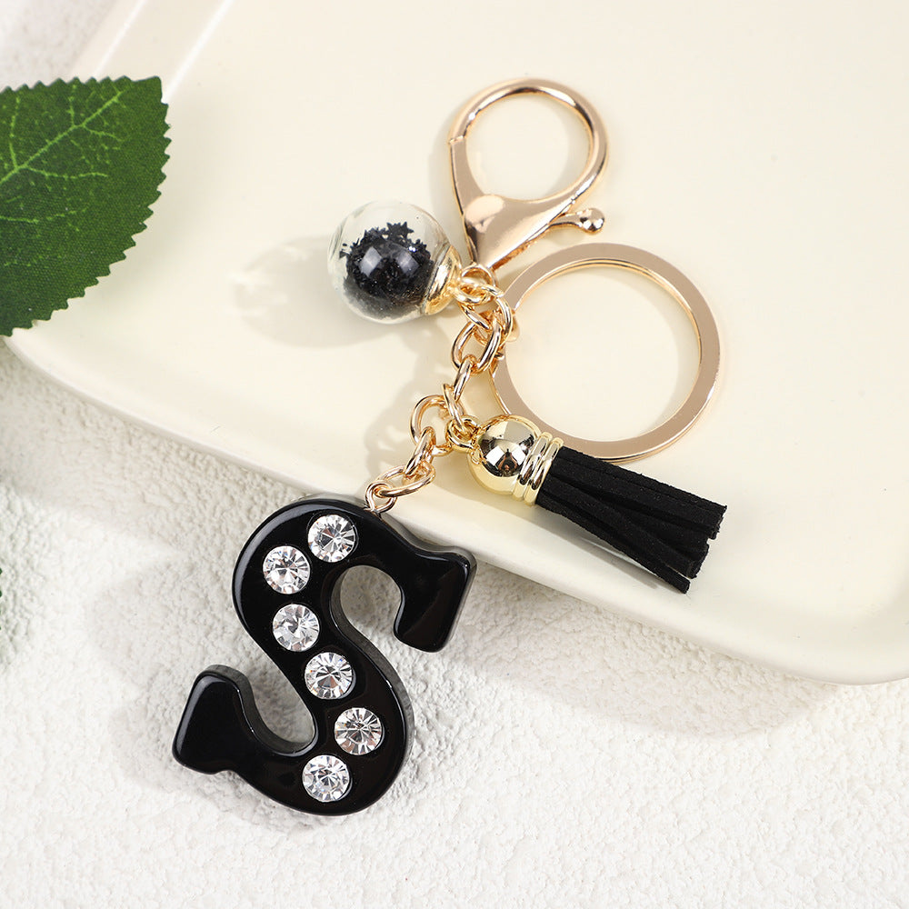 Llavero de resina negra con letras de diamantes de imitación, accesorio de arte moderno
