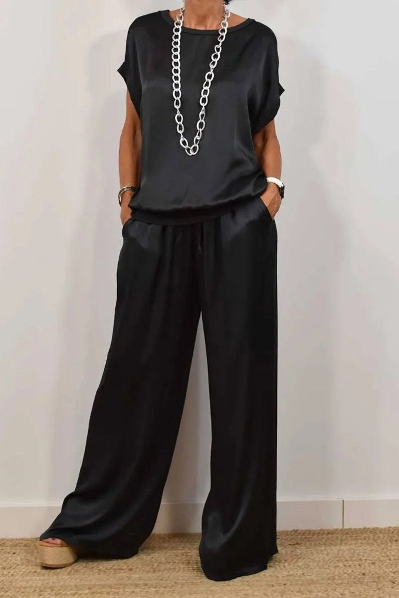Conjunto de dos piezas de camiseta holgada de manga corta y pantalón ancho de color liso para mujer