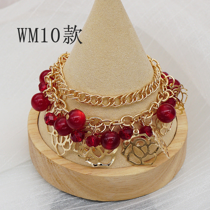 Pulsera bohemia con colgante floral en forma de corazón
