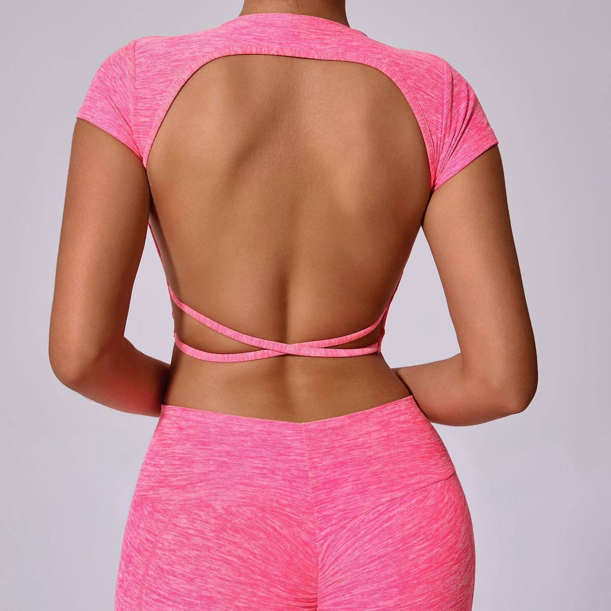 Top de yoga de manga corta de color liso sexy para mujer