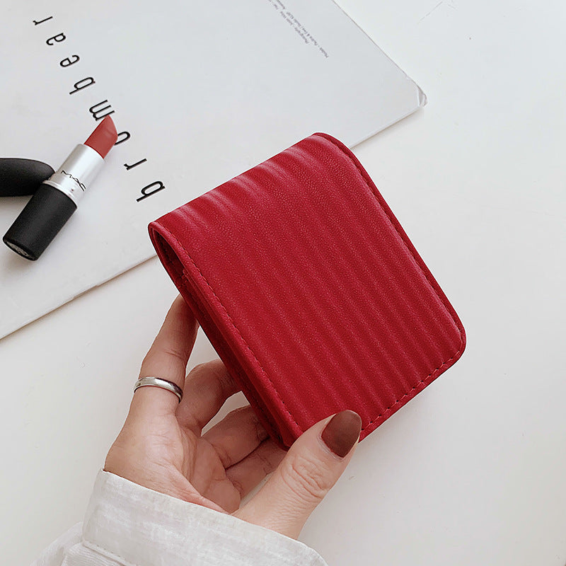 Mini trousse de maquillage portable simple et de couleur unie pour femme