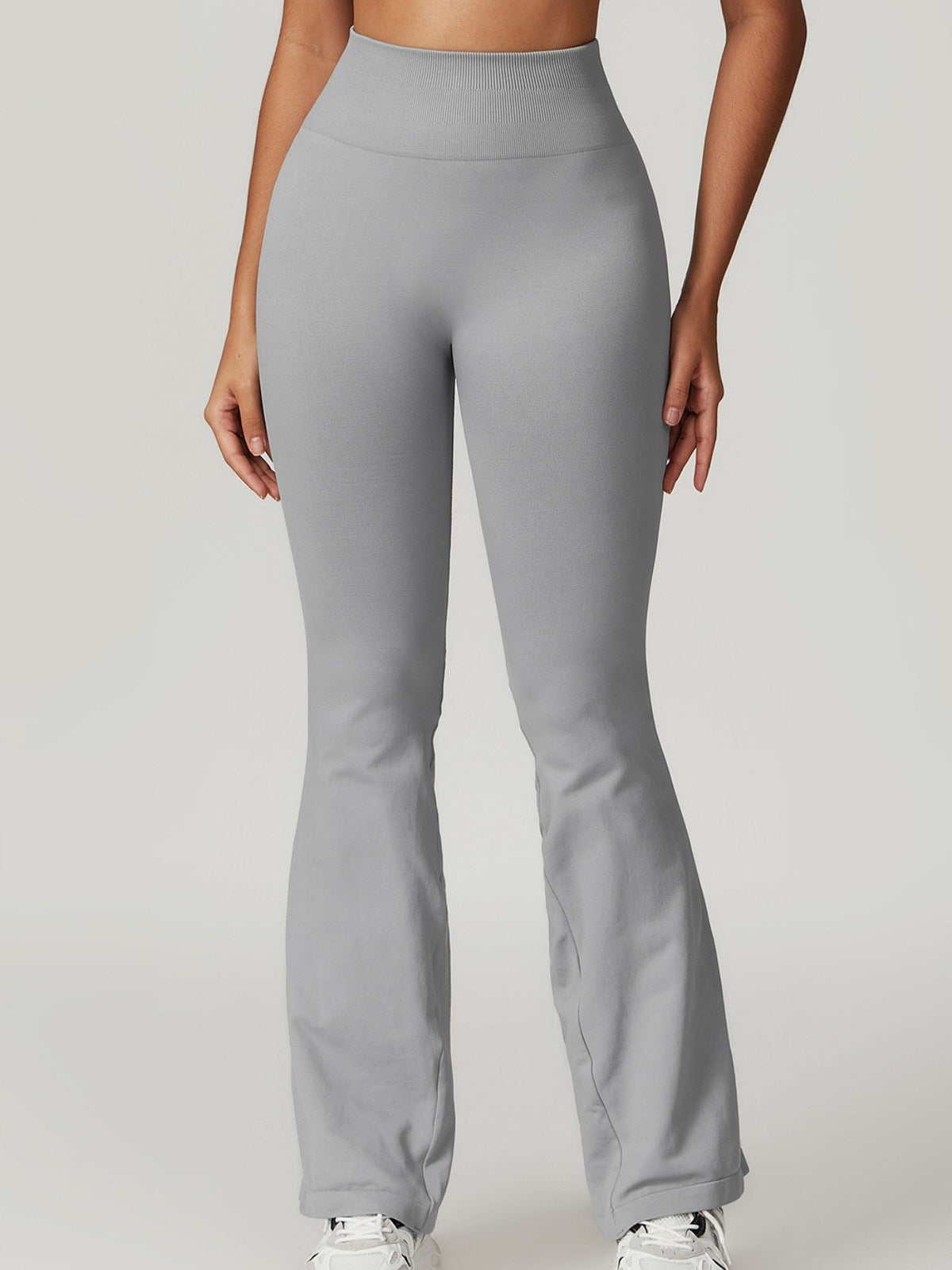 Pantalones deportivos acampanados de color liso de moda de yoga para mujer