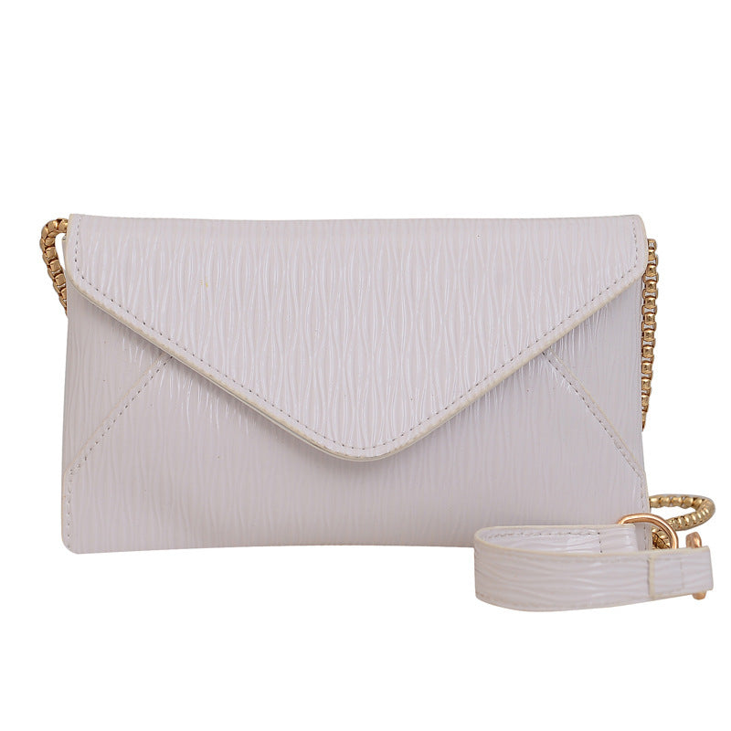 Sac enveloppe en PU de couleur unie pour femme, style décontracté et tendance