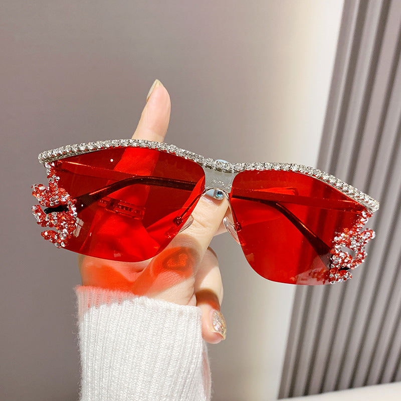 Gafas de sol sin montura con diamantes de imitación de metal irregulares de moda con un estilo único