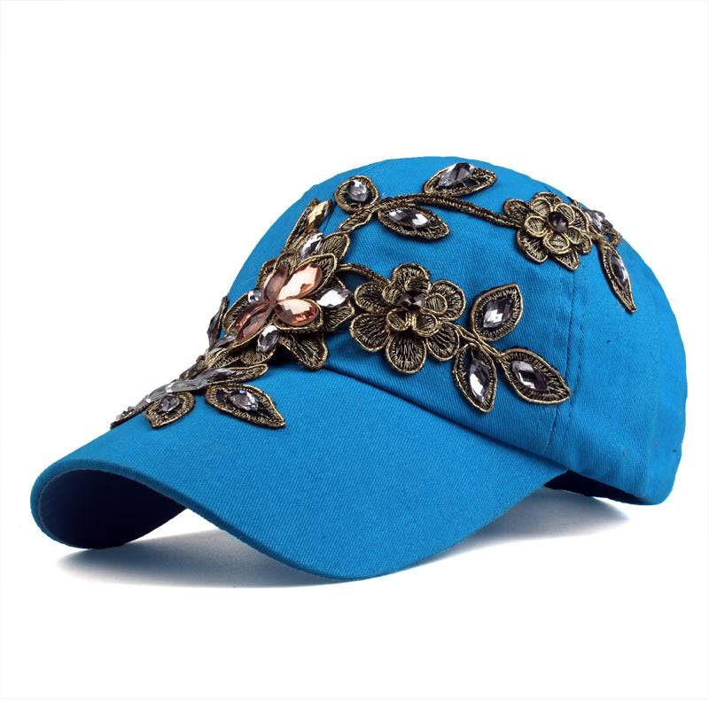 Casquette pare-soleil en soie dorée et diamant pour femme