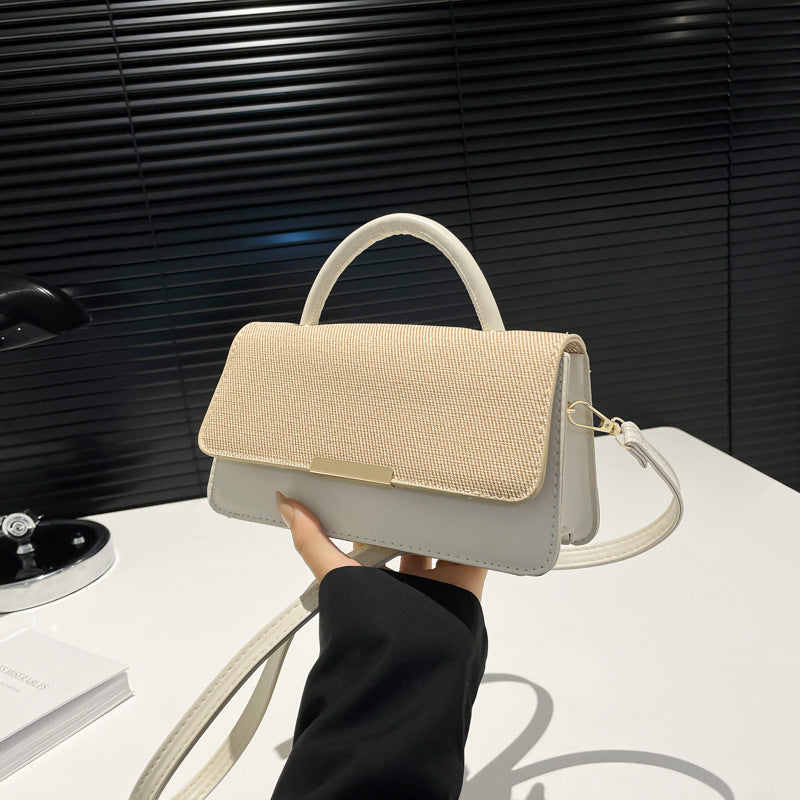 Bolso de mano con costuras abatibles de moda - Tendencia urbana