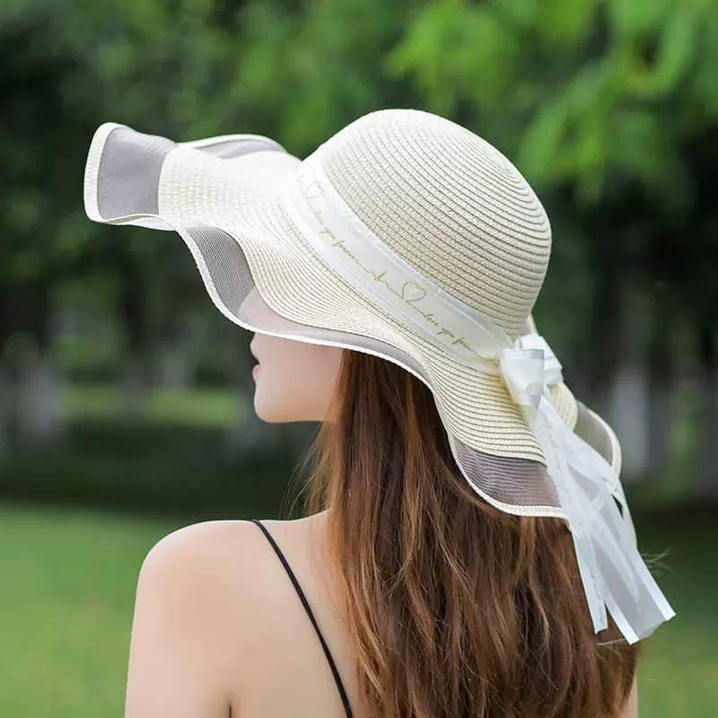 Sombrero de paja con lazo para playa, vacaciones y moda de verano para mujer