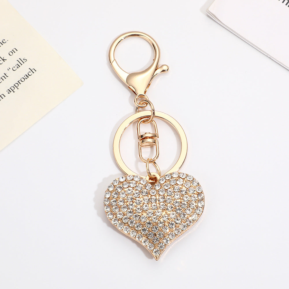 Llavero con colgante de corazón de diamantes de imitación para mujer