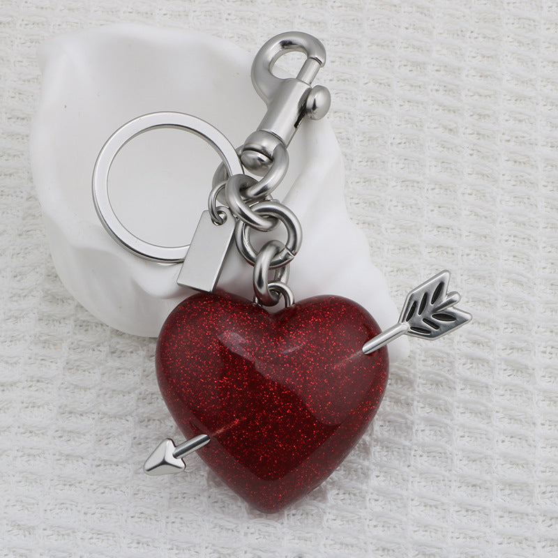 Llavero con colgante de bolso rojo de resina estilo urbano para mujer