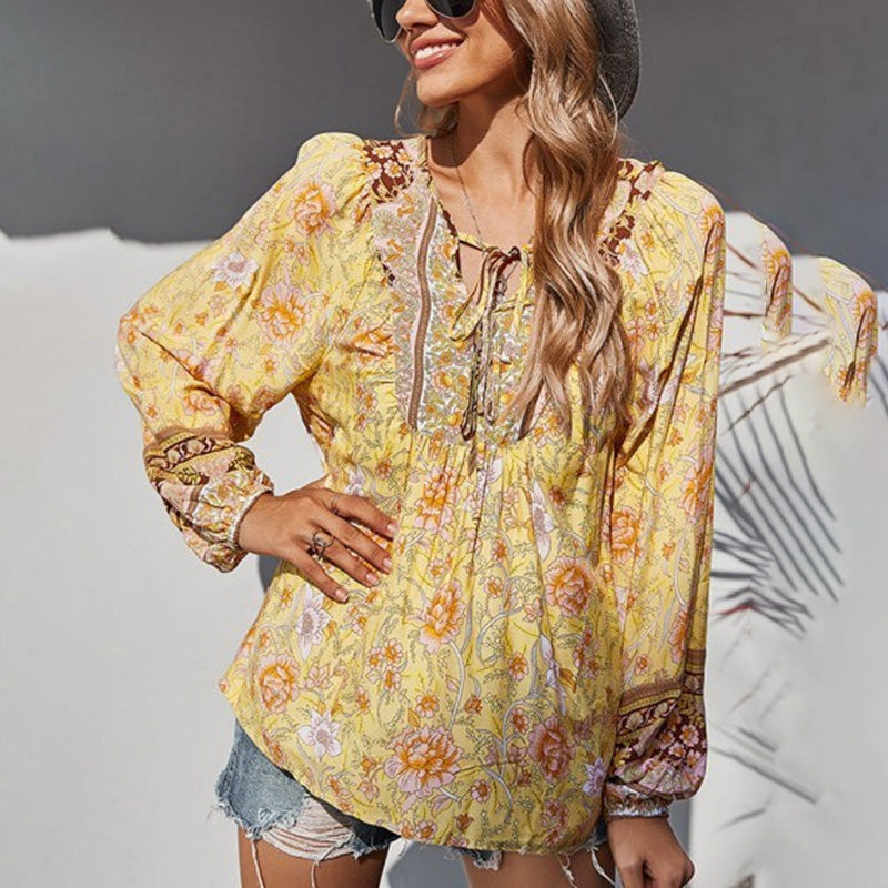 T-shirt décontracté à col en V et imprimé floral pour femme