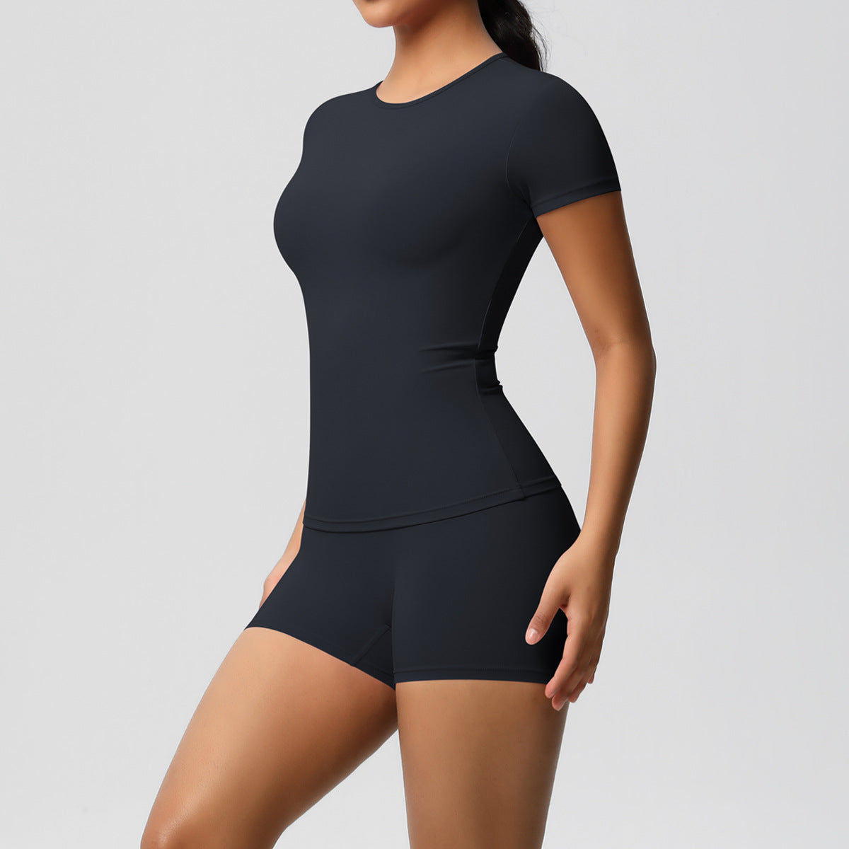 Ensemble de yoga décontracté pour femme, t-shirt à manches courtes et short moulant de couleur unie