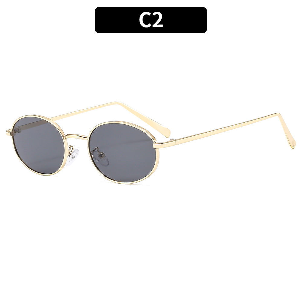 Gafas de sol ovaladas retro con montura metálica elegante