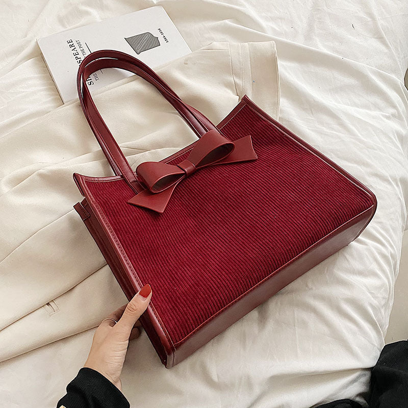 Bolso de mano de verano para mujer, de color liso y moderno.