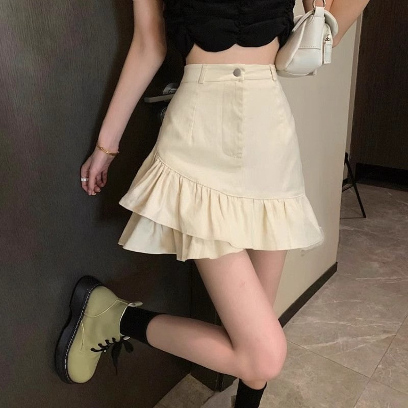 Falda vaquera con volantes irregulares de color liso sexy a la moda para mujer