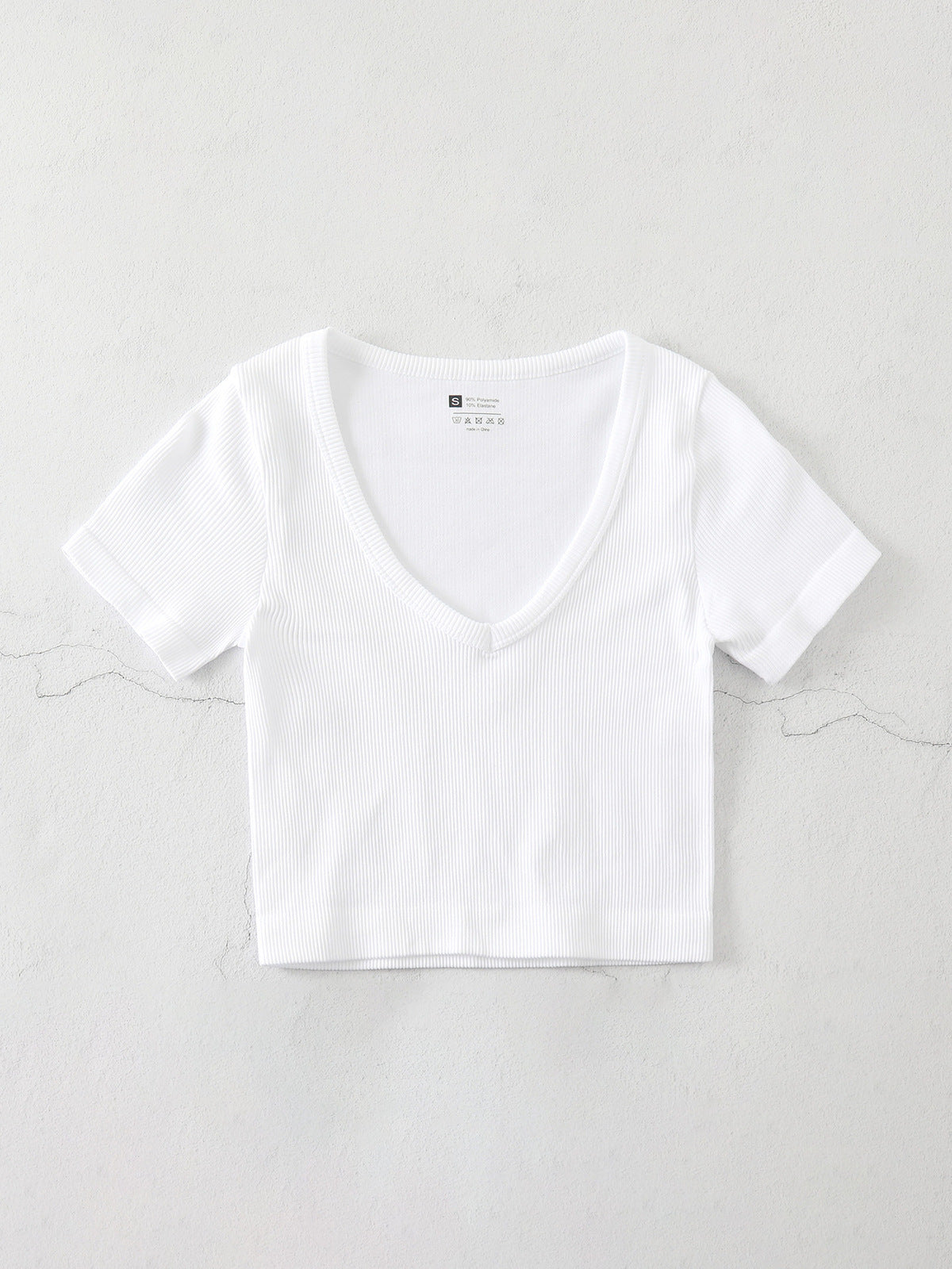 Camiseta de yoga informal de color liso con cuello en V para mujer