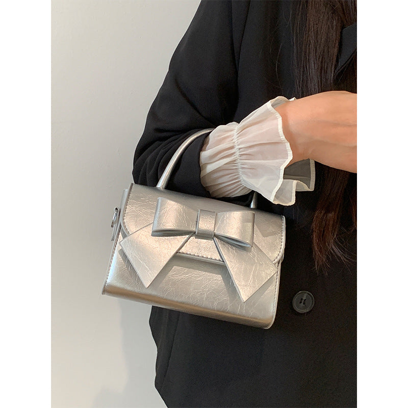 Bolso de mano pequeño cuadrado con lazo de color liso elegante para mujer