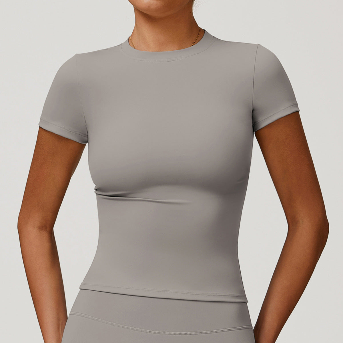 Camiseta informal de color liso de secado rápido para mujer